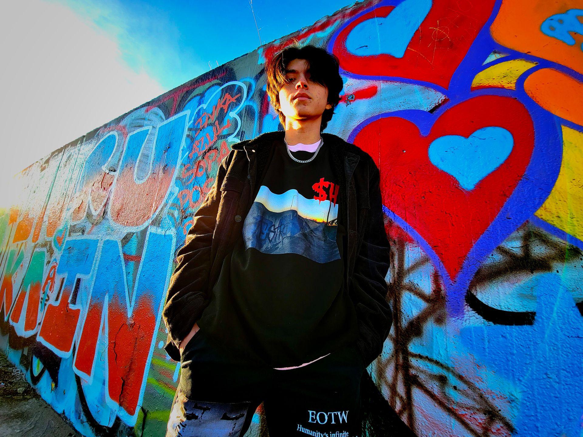 Young Male Model Wears Destroy Crewneck